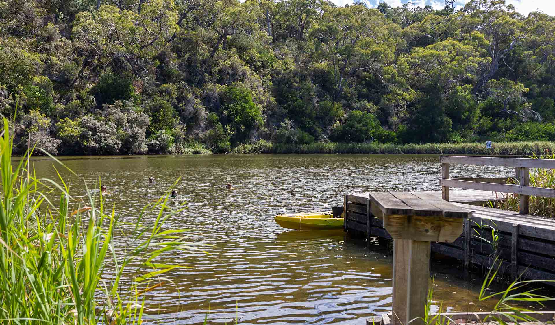 A kayak lashed to the jetty at Forest South Campground at Lower Glenelg National Park