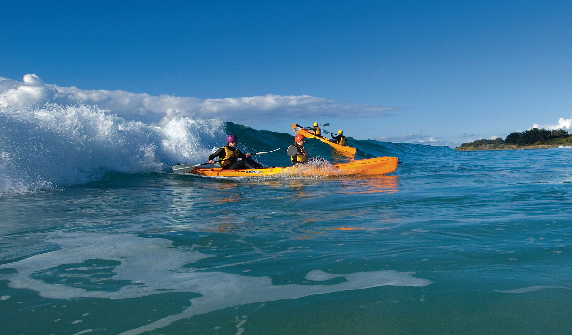 Two groups of people sea kayaking at Marengo Reefs Marine Sanctuary