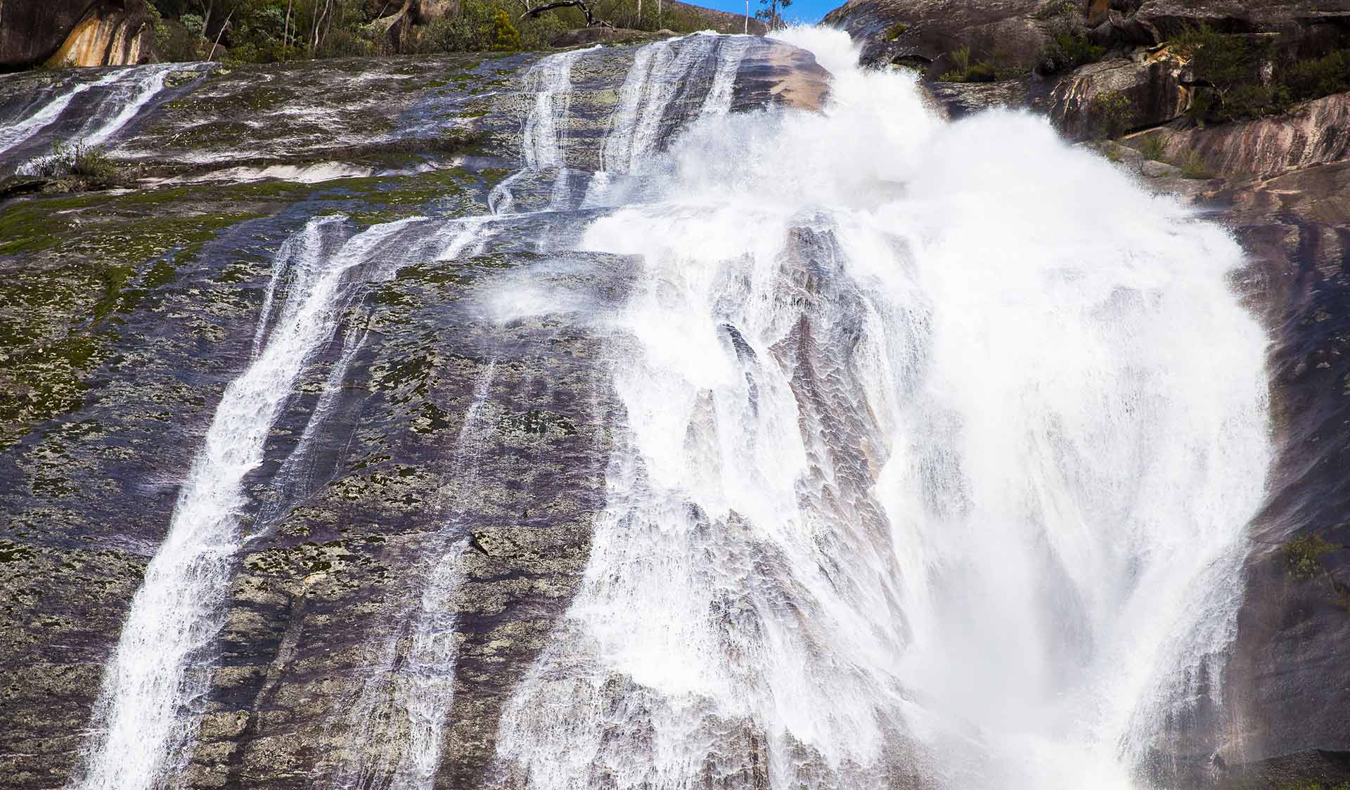 Water cascades down the granite rockface at Eurobin Falls.