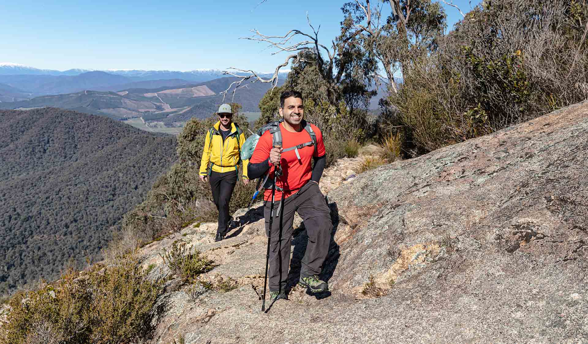 Two hikers at Mackeys lookout on the Big Walk up Mount Buffalo