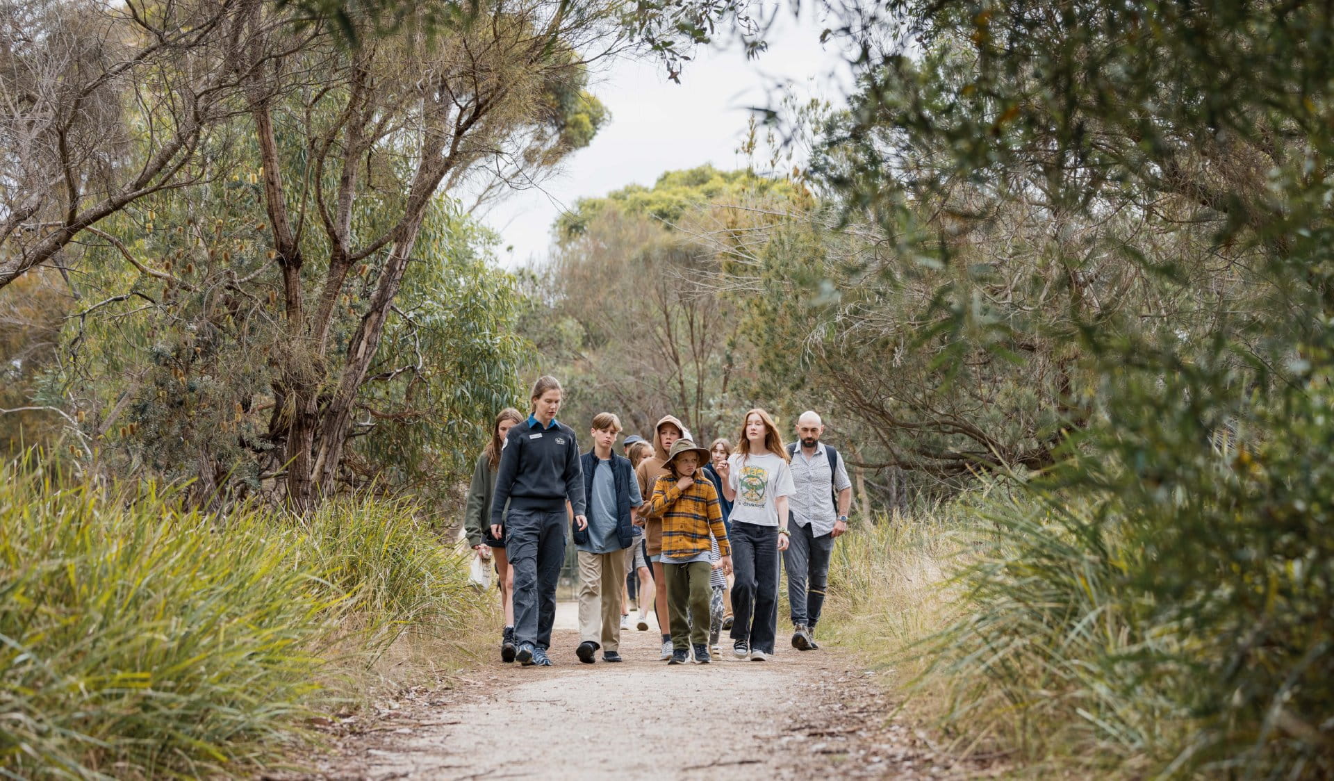 Group of junior rangers walking through path in Ocean Grove Nature Reserve