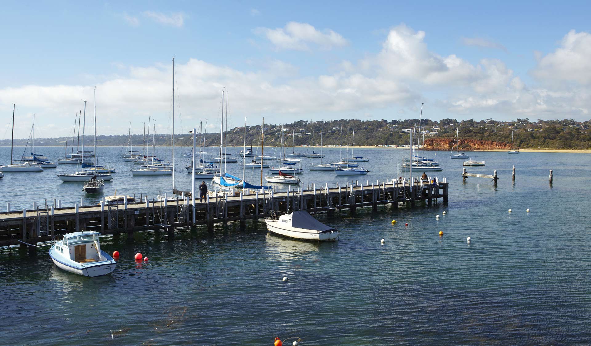 Boats moored at Mornington Pier