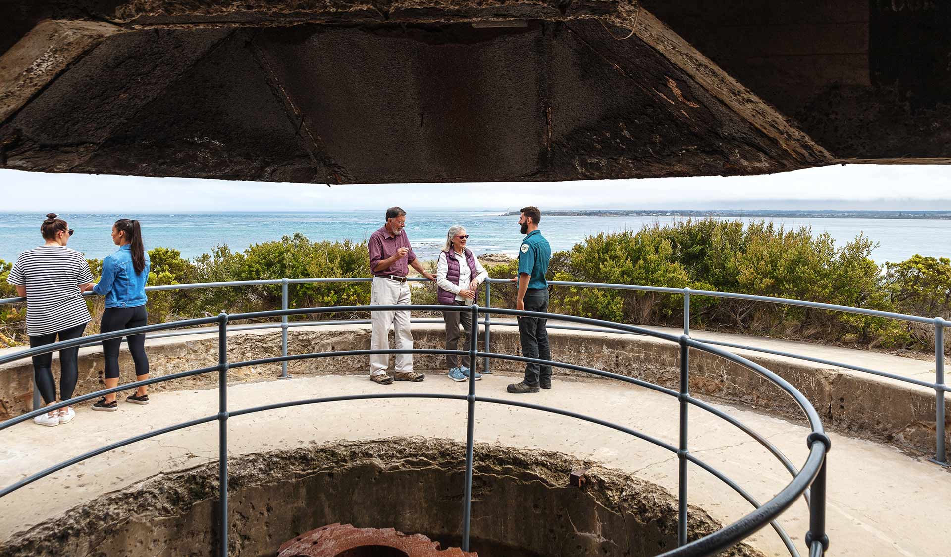 A retired coulpe chat with a Parks Victoria Ranger at Fort Nepean. 