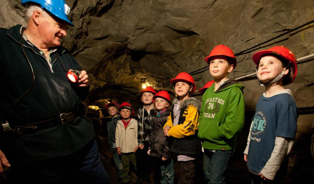 A group of children on a tour in the State Coal Mine.