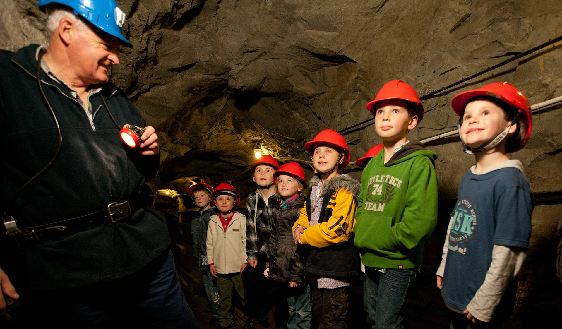 A group of children on a tour in the State Coal Mine.