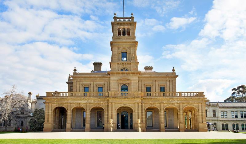 The facade of the historic Werribee Park Mansion.