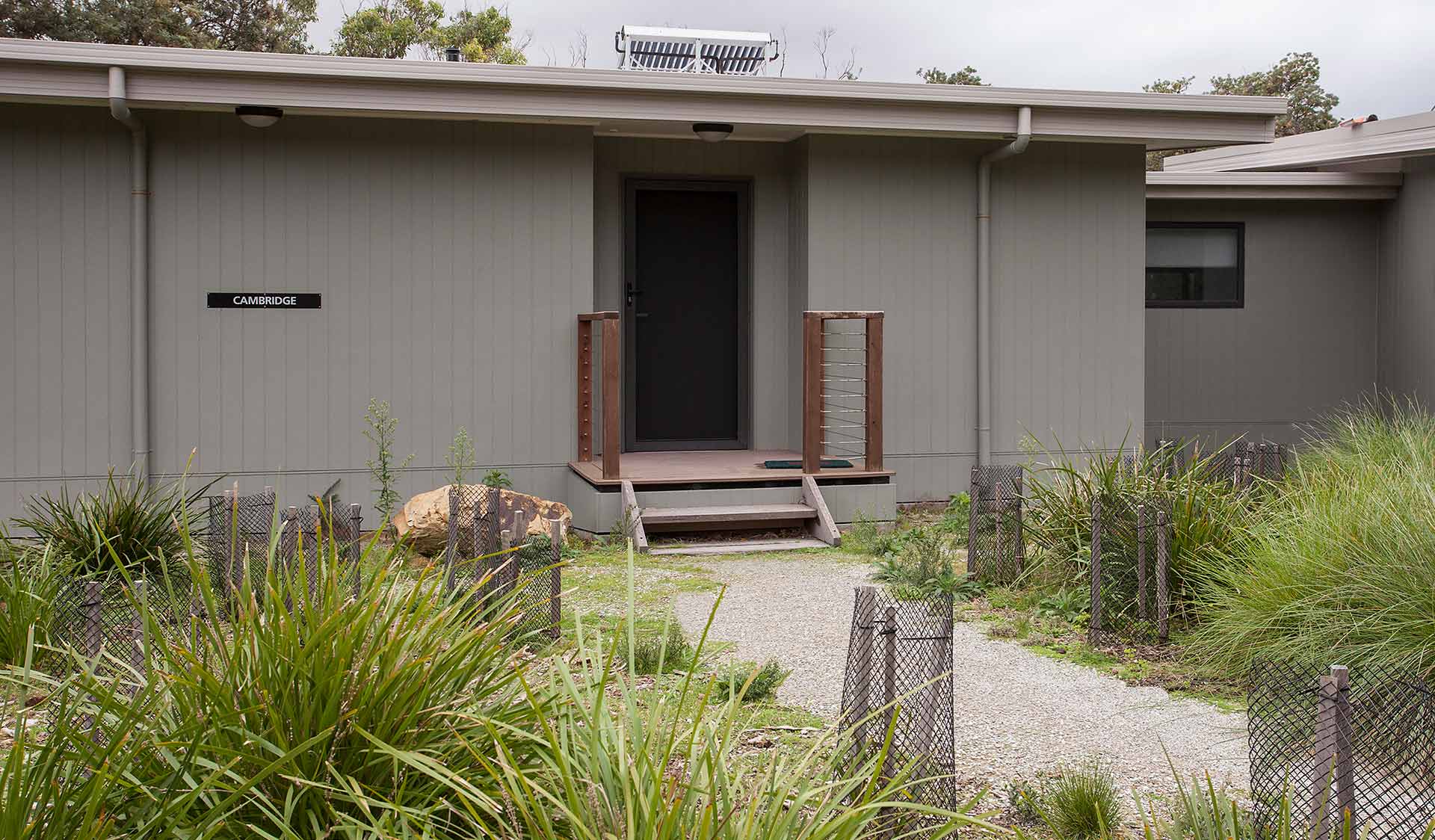 The entrance with two steps up to the door at a unit in Tidal River at Wilsons Promontory National Park