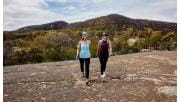 Two women walking for fitness at Big Rock in You Yangs Regional Park