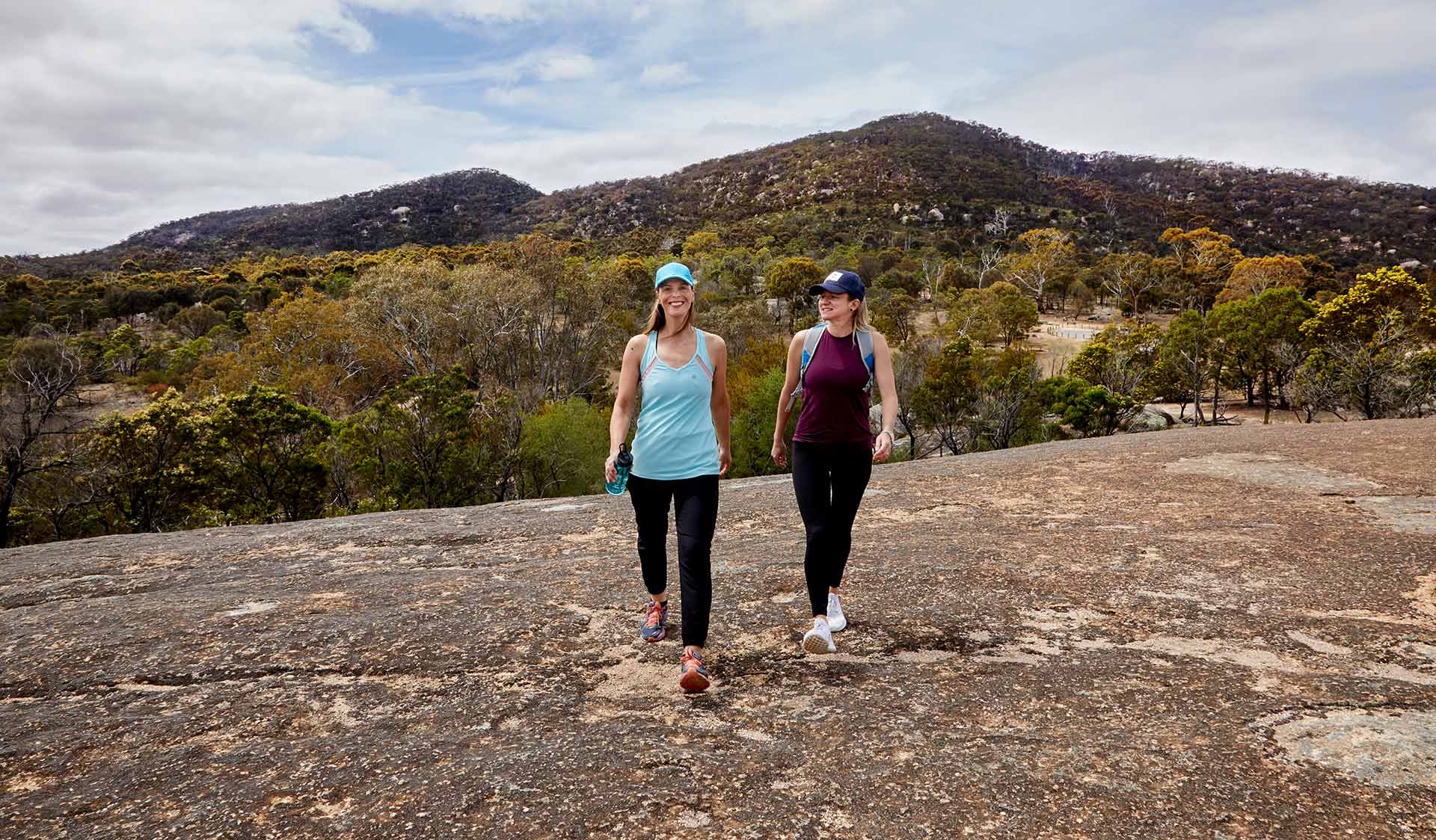 Two women walking for fitness at Big Rock in You Yangs Regional Park