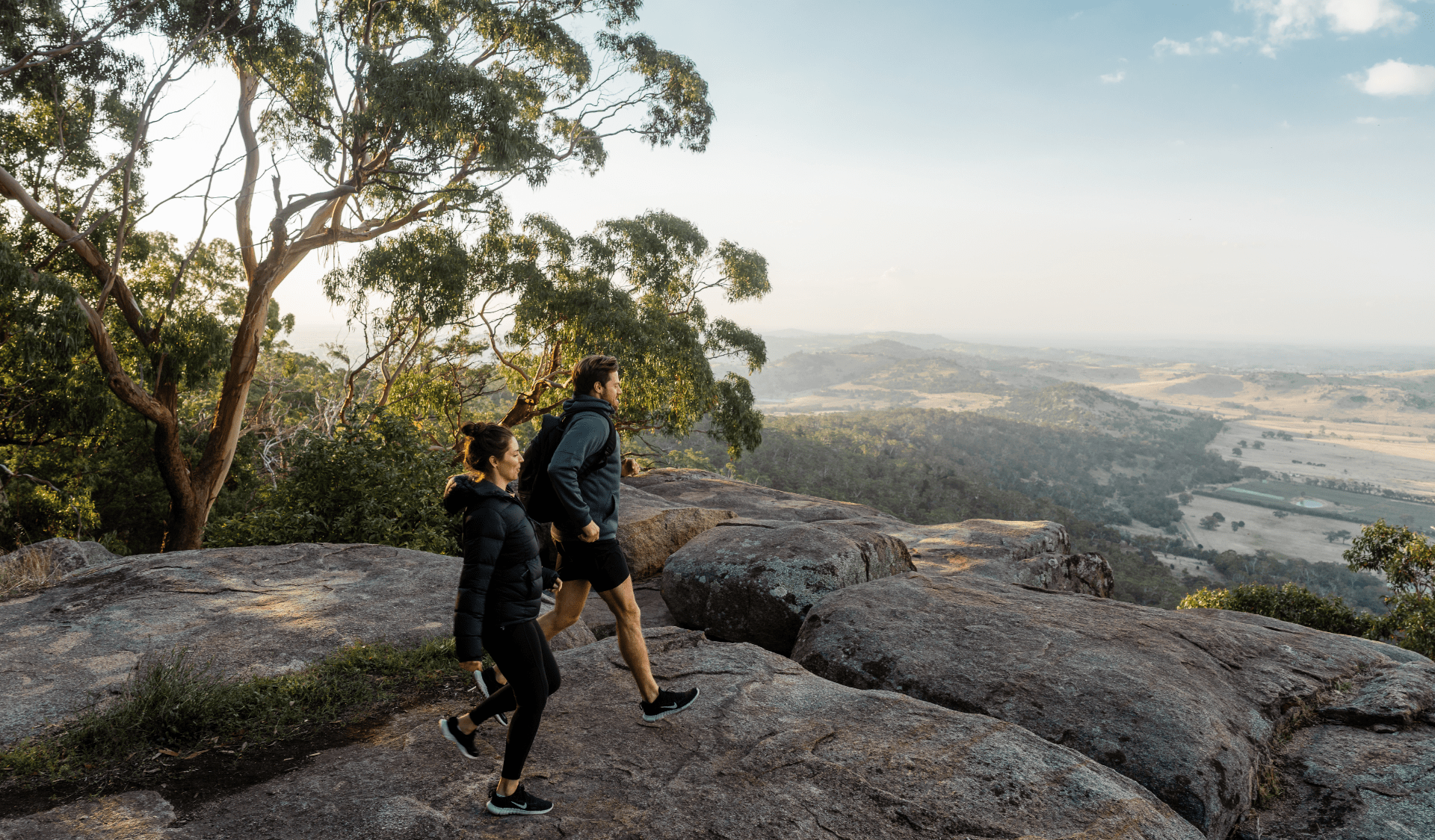 Hiking friends reaching Langs Lookout Mount Alexander Regional Park