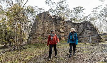 Two woman walking at the Garfield Wheel in Castlemaine Diggings National Park