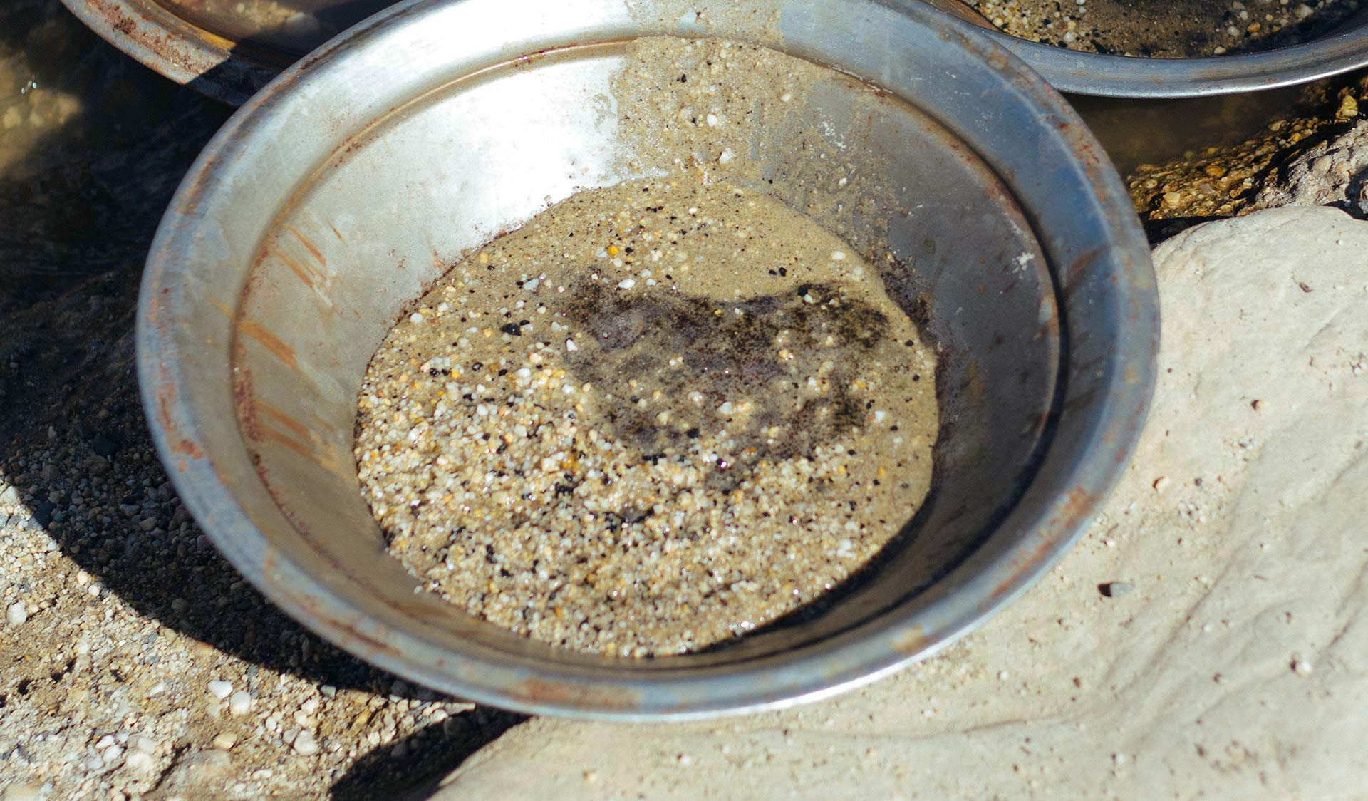 A pan filled with silt.
