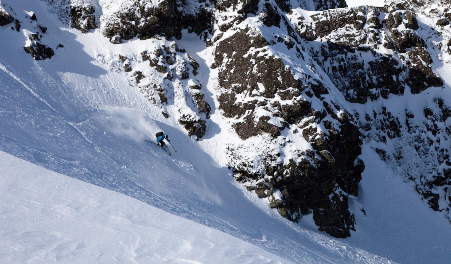 A ski-mountaineer tackles a steep slope on the side of Mt Bogong.