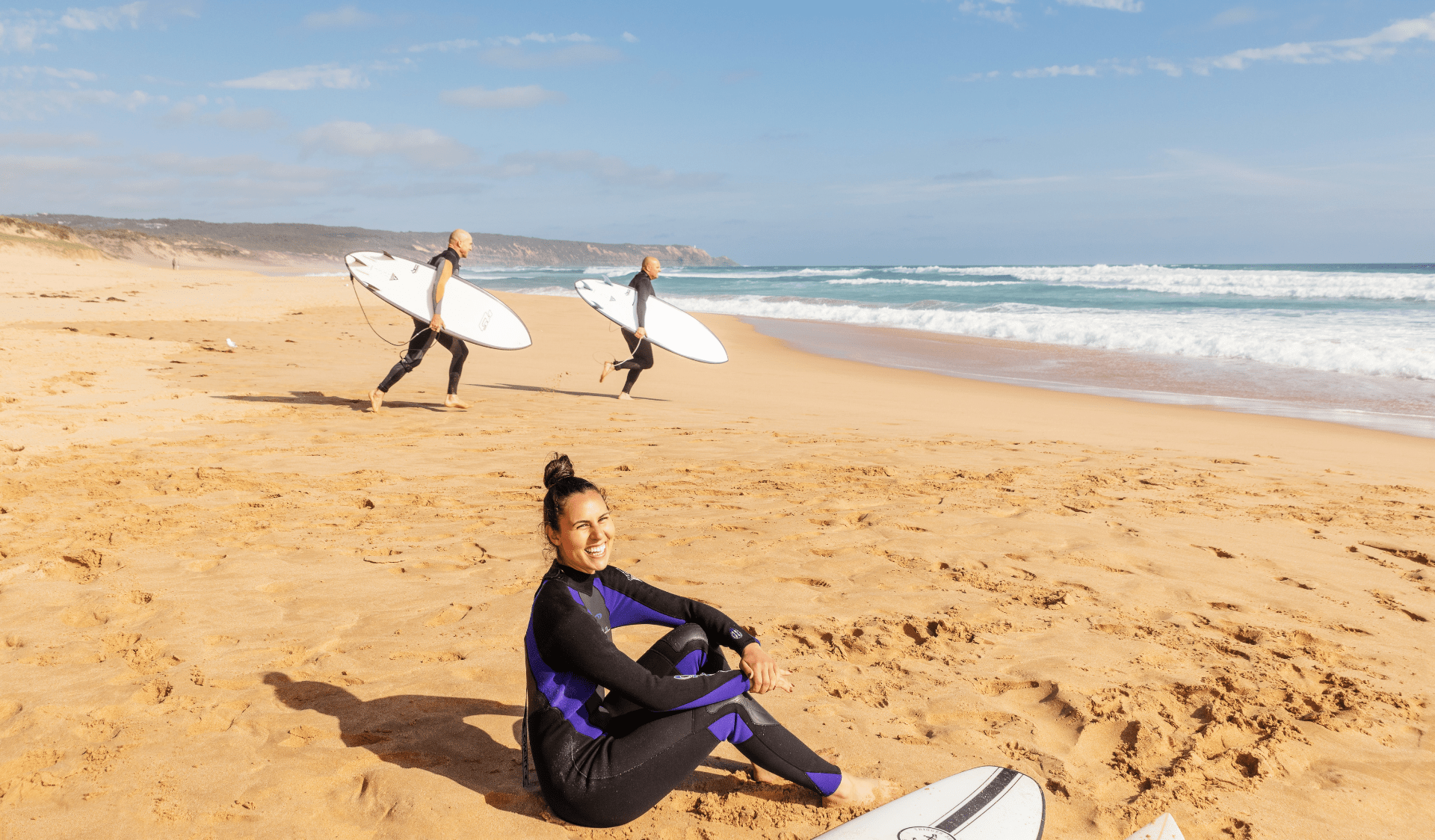Surfers at Gunnamatta Beach, Mornington Peninsula National Park.