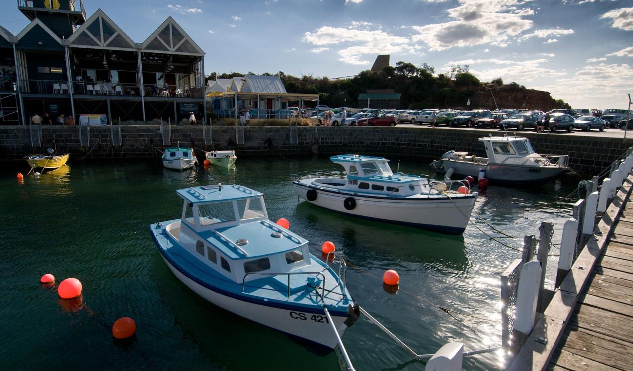boats moored at a jetty